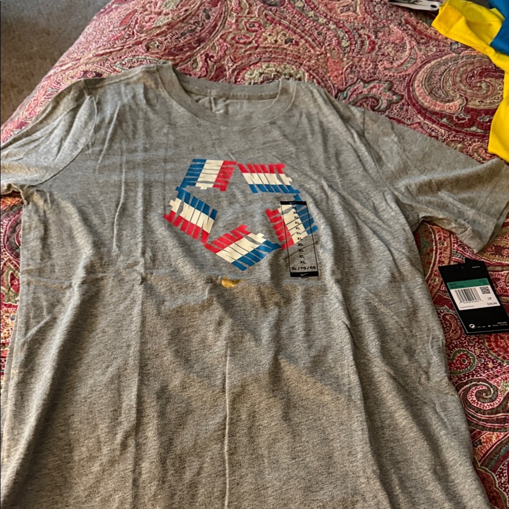 Nike Gray T-Shirt with Colorful Star Graphic